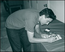Chris giving autographs